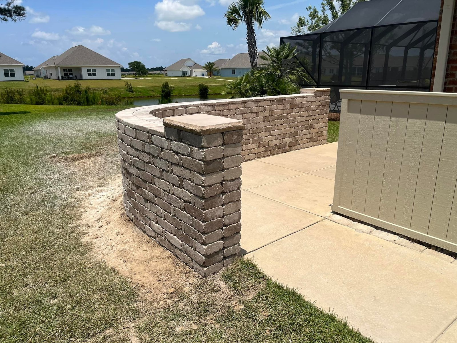 Boost your curb appeal with custom retaining walls and raised flower beds in Foley, AL. Durable, beautiful, and expertly built. Free estimates available.